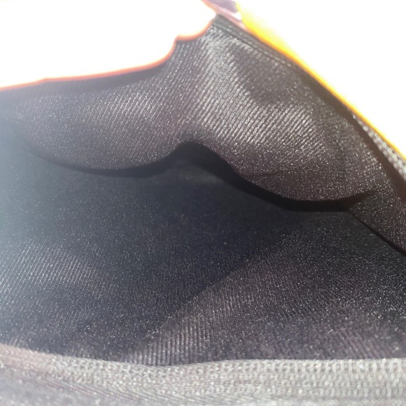 Sherpani Espirit Sling backpack in the color yellow black white - Picture 8 of 11